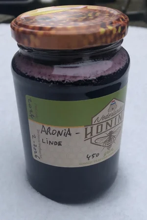 450g. Rauwe Aronia-linde-honing (5% onverhitte bessen)